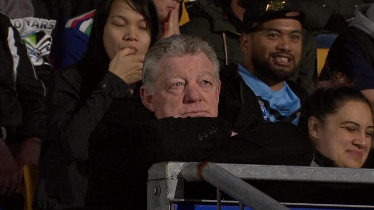 Panthers general manager Phil Gould looks dejected after his team concedes another try to the Warriors.