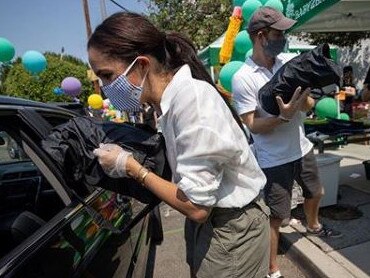 Meghan Markle and Prince Harry volunteer at a school charity drive in Los Angeles. Picture: Instagram