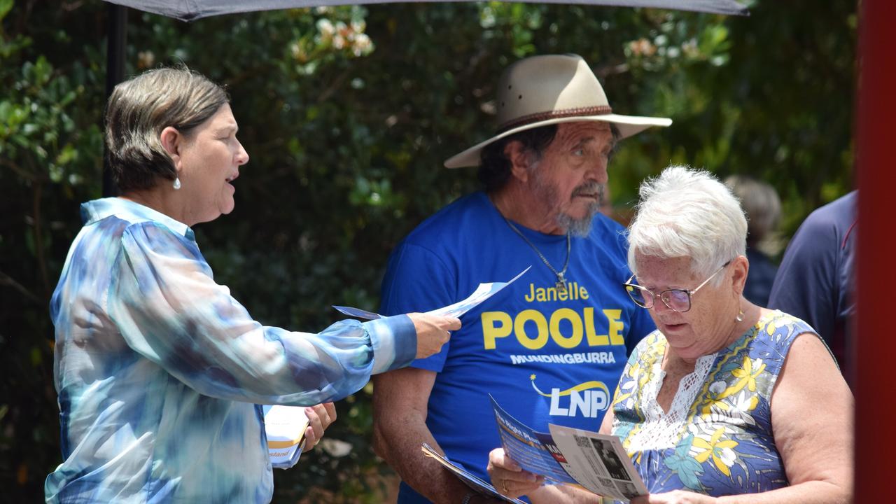 Mundingburra candidates Les Walker, Janelle Poole and Michael Pugh meet with early voters on October 14. Photo: Daniel Shirkie.