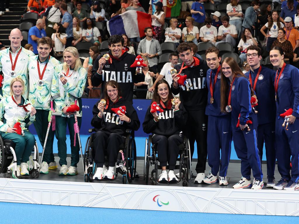 Gold medallists Team Italy (C), Silver medallists Team Australia (L) and Bronze medallists Team United States (R). (Photo by Sean M. Haffey/Getty Images)