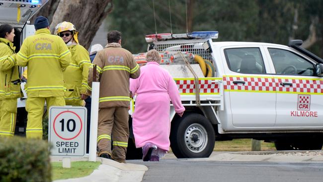 Residents rushed from their homes in the retirement village before fire crews arrived. Picture: Andrew Henshaw