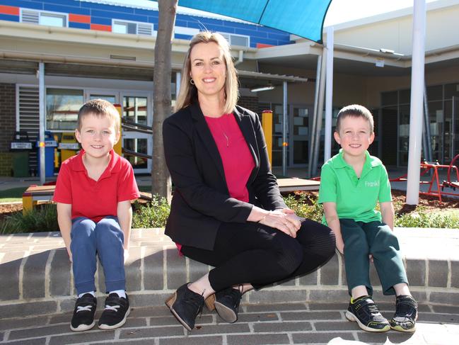 Franklin Early Childhood School principal Kate Flynn and twin students Micah and Levi.