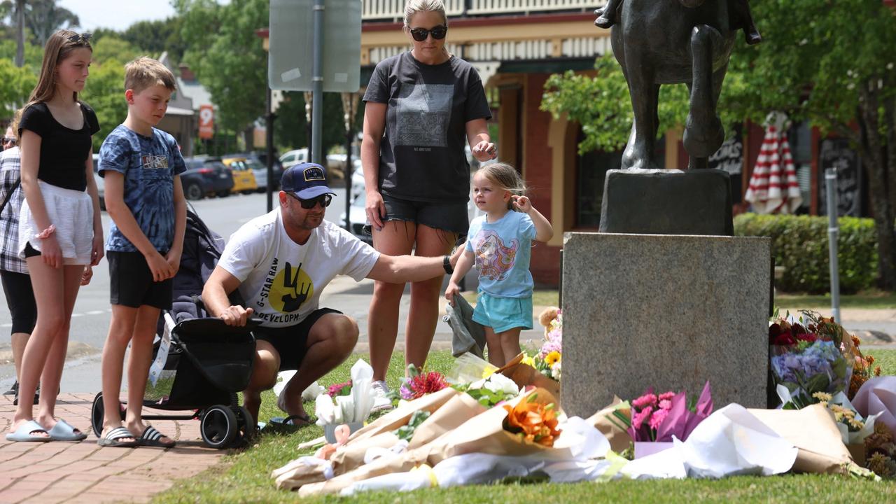 Locals have flocked to the crash site to offer flowers and their condolences Picture: NCA NewsWire / Brendan Beckett