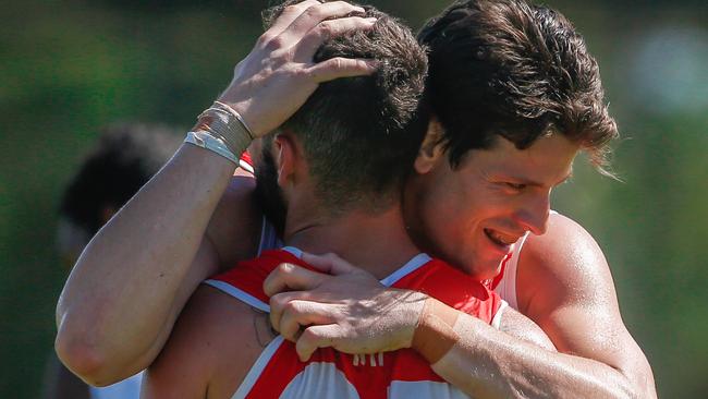 Justin Beugelaar congratulates teammate Dylan Collis' goal against Palmerston in yesterday’s Men's Premier League game. Picture: GLENN CAMPBELL