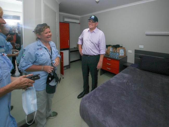 Scott Morrison and Mission Lead Cath McDermott in a single room during a visit to the Howard Springs Quarantine Facility Picture Glenn Campbell