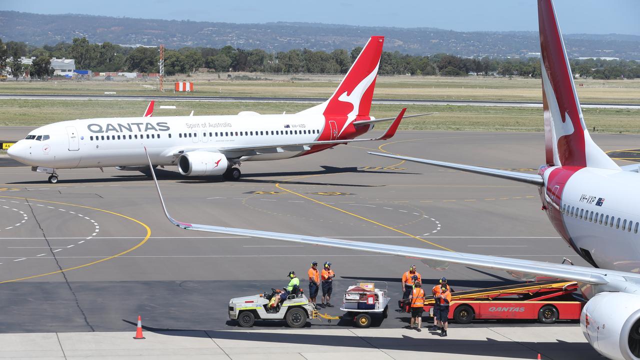 Despite Australia rolling out its vaccine program this week it is still unlikely international travel will return anytime soon. Picture Dean Martin