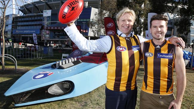 Hawthorn great Dermott Brereton and Jonathan Simpkin with the batmobile in 2015.