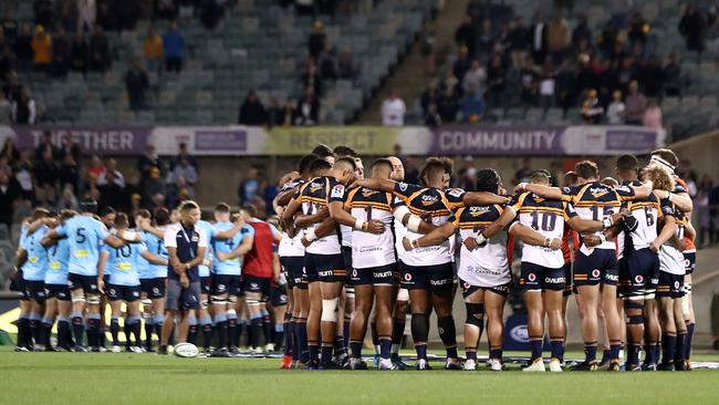 Brumbies and Waratahs players remembered the victims of the Christchurch shooting ahead of their match last Friday night. Picture: Getty Images 