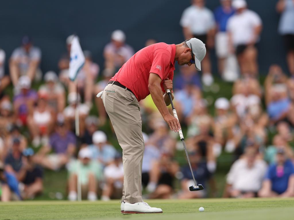 CASTLE ROCK, COLORADO - AUGUST 24: Adam Scott of Australia putts on the 17th green during the third round of the BMW Championship at Castle Pines Golf Club on August 24, 2024 in Castle Rock, Colorado. (Photo by Harry How/Getty Images)