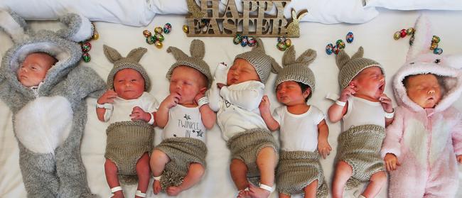 Babies dressed up as Easter bunnies at Gold Coast Private Hospital after an Easter baby boom . Left to right, Remi Fordham, Clare Newham, Lewis McClintock, Leo Martin, Rowan Sahej Singh, Grace Sharp, and Florence Vicary. Picture Glenn Hampson