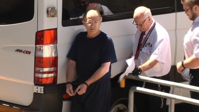 Domenic Perre being led into Adelaide Magistrates Court during a previous hearing. Picture: Nine News