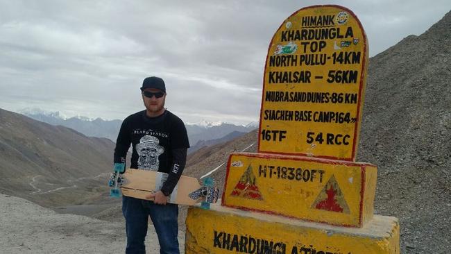 Aleks Stocki holds the record for highest altitude skateboarding at 5355m. Picture: Guinness World Record.