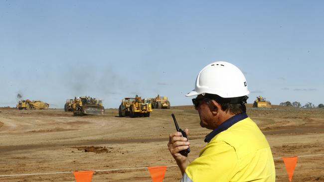 More than 200 machines have been deployed for major earthworks. Picture: John Appleyard