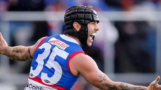 BALLARAT, AUSTRALIA - AUGUST 25: Caleb Daniel of the Bulldogs celebrates a goal during the 2024 AFL Round 24 match between the Western Bulldogs and the GWS GIANTS at Mars Stadium on August 25, 2024 in Ballarat, Australia. (Photo by Dylan Burns/AFL Photos via Getty Images)