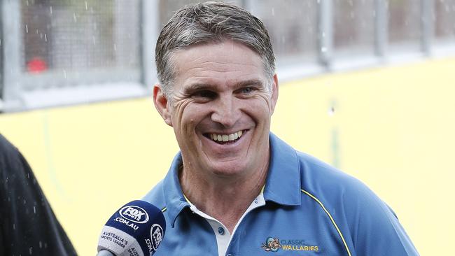 Former Wallaby Tim Horan addressing the media regarding a new mural being painted next to Milton Road, Brisbane 16th October 2017. (AAP Image/Josh Woning)