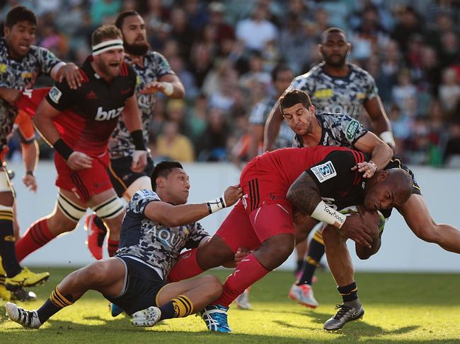 CANBERRA, AUSTRALIA - APRIL 24: Nemani Nadolo of the Crusaders breaks through the Brumbies defence to score a try during the round nine Super Rugby match between the Brumbies and the Crusaders at GIO Stadium on April 24, 2016 in Canberra, Australia. (Photo by Stefan Postles/Getty Images)