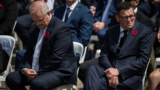 Prime Minister Scott Morrison and Premier Daniel Andrews attend the Remembrance Day service in Melbourne on Thursday. Picture: Darrian Traynor/Getty Images