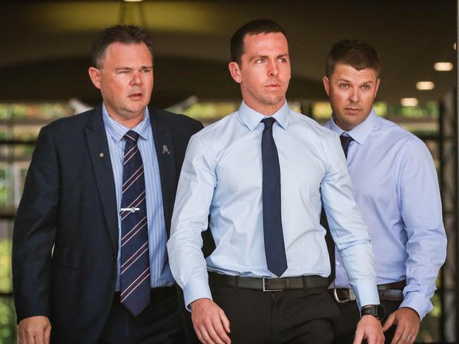 Constable Zachary Rolfe , flanked by supporters attends the Supreme Court of the Northern Territory on the first day of pre trial proceedings in his murder trial for the death of Kumajayi Walker in Yuendemu in November 2018 Today 19/07/2021.Picture: Glenn Campbell