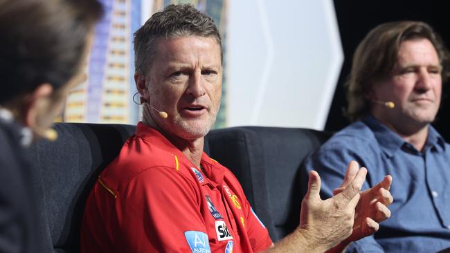 Gold Coast Bulletin editor Ryan Keen (left) chats to Gold Coast Suns coach Damien Hardwick and Gold Coast Titans coach Des Hasler at the Future Gold Coast breakfast at the Gold Coast Convention and Exhibition Centre. Picture: Glenn Hampson