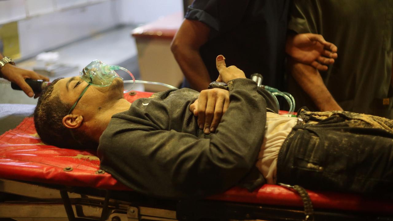 A Palestinian injured during Israeli raids arrive at Nasser Hospital south of the Gaza Strip. Picture: Getty Images