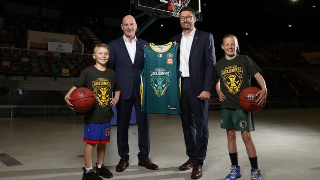 Premier Peter Gutwein and Tasmania Jack Jumpers CEO Simon Brookhouse alongside junior basketball players, William Anderson, 10 of Howrah and Ella Geard, 10 of Bellerive as they announce the name of Tasmania's NBL team the Jack Jumpers at the Derwent Entertainment Centre. Picture: Zak Simmonds