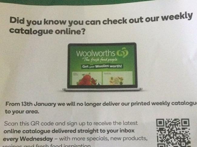 Woolworths notifies customers in one Melbourne suburb that has stopped distributing printed version of their catalogue with an instore brochure. Picture: Darren Cartwright