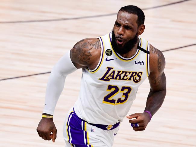 LAKE BUENA VISTA, FLORIDA - OCTOBER 11: LeBron James #23 of the Los Angeles Lakers reacts during the fourth quarter against the Miami Heat in Game Six of the 2020 NBA Finals at AdventHealth Arena at the ESPN Wide World Of Sports Complex on October 11, 2020 in Lake Buena Vista, Florida. NOTE TO USER: User expressly acknowledges and agrees that, by downloading and or using this photograph, User is consenting to the terms and conditions of the Getty Images License Agreement.  (Photo by Douglas P. DeFelice/Getty Images)