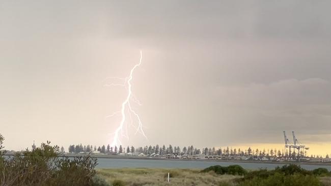 Lightning strikes over Outer Harbor. Picture: Nathan Waters