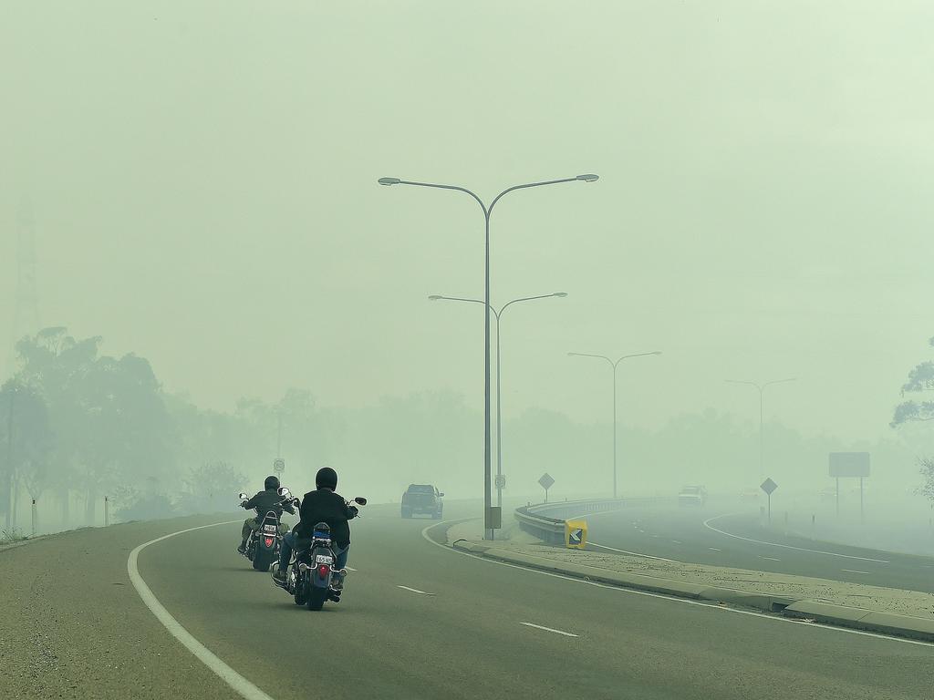 A fire burning south of Townsville has masked the Bruce Highway (PICTURED) in smoke. The vegetation fire started near the JBS Meatworks at Stuart. PICTURE: MATT TAYLOR.