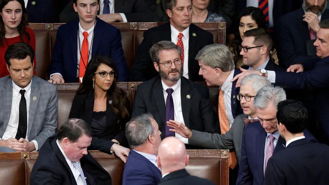 Mike Rogers (right) is restrained by Richard Hudson after getting into an argument with Rep.-elect Matt Gaetz (R-FL) as House Republican Leader Kevin McCarthy walks away.