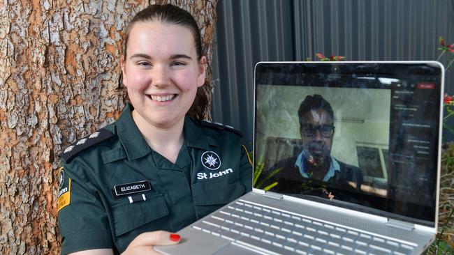 St John Ambulance volunteer Elizabeth Cowan, 22, chats online during Lockdown II with her St John colleague Yonathon Boyle. Picture: Brenton Edwards