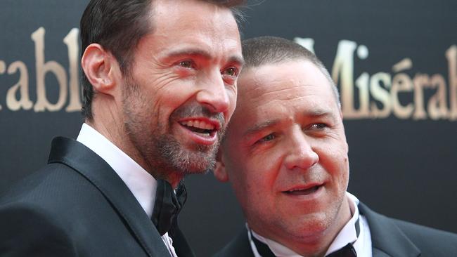 Fellow Aussies in Hollywood, Hugh Jackman and Russell Crowe. Picture: AAP Image/Marianna Massey