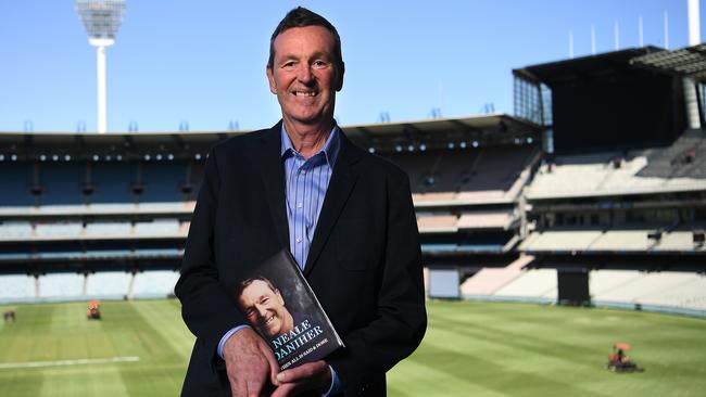 Neale Daniher with his book, <i>When All is Said &amp; Done</i>. Pic: AAP