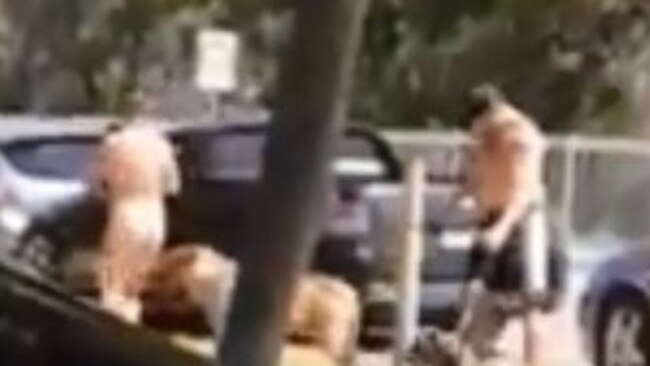 A man has been captured on film kicking and dragging his dog from a ute. Photo: Supplied.