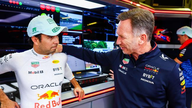 Perez and Horner talk in the garage prior to the race in Mexico. (Photo by Mark Thompson/Getty Images)