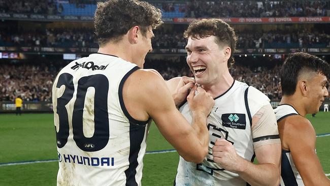 Charlie Curnow and matchwinner Blake Acres. Picture: Michael Willson/AFL Photos via Getty Images