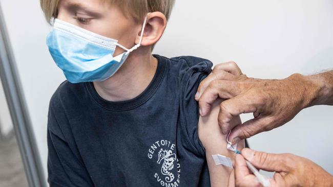 A 10-year-old boy in Denmark receives his Covid vaccination. Picture: AFP