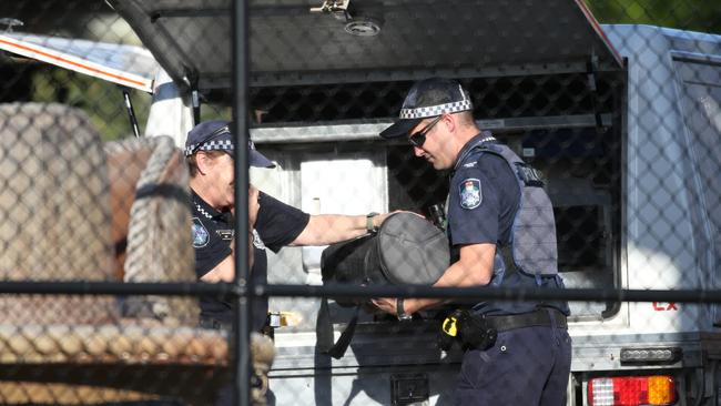 Police officers responding to the Dreamworld disaster. Picture: Nigel Hallett