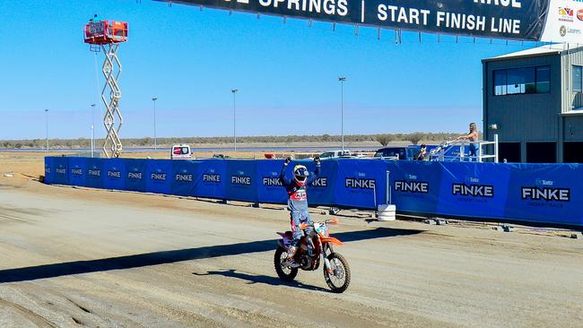 David Walsh crosses the finish line first at the 2019 Tatts Finke Desert Race. Picture: MATT HENDERSON