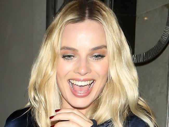 Cara Delevingne and Margot Robbie seen here leaving Claridges hotel in London wearing matching blue tracksuits with embroidered initials and matching trainers as they make there way to the Suicide Squad premier afterparty to party with the rest of the cast. The actress's looked in high spirits as they walked arm in arm out the hotel. Pictured: Cara Delevingne, Margot Robbie Ref: SPL1329496 030816 Picture by: Splash News Splash News and Pictures Los Angeles: 310-821-2666 New York: 212-619-2666 London: 870-934-2666 photodesk@splashnews.com