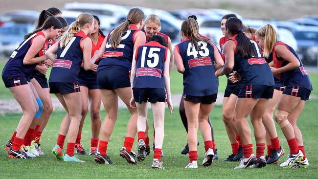 A Mt Eliza girls’ team warms up for a match at Emil Madsen Reserve, Mt Eliza. Picture: Andrew Batsch