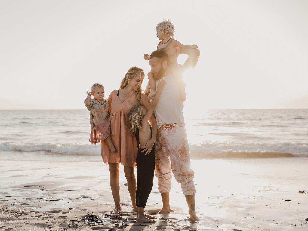 Teresa Palmer with her family at sunset at Port Willunga Beach, SA. Picture: Carmen Yeates, @rosegrace_photography