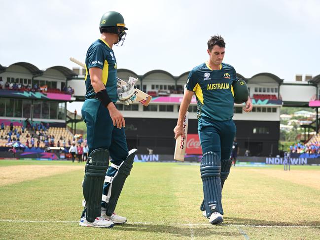 Pat Cummins and Mitchell Starc of Australia cut dejected figures following the loss to India. Picture: Alex Davidson-ICC/ICC via Getty Images