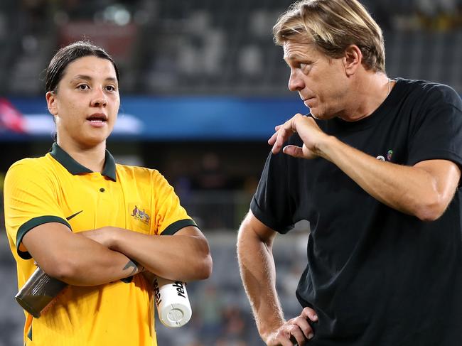 SYDNEY, AUSTRALIA - FEBRUARY 19: Australia's coach Tony Gustavsson speaks with Sam Kerr of Australia at full time during the 2023 Cup of Nations Match between Australian Matildas and Spain at CommBank Stadium on February 19, 2023 in Sydney, Australia. (Photo by Brendon Thorne/Getty Images)