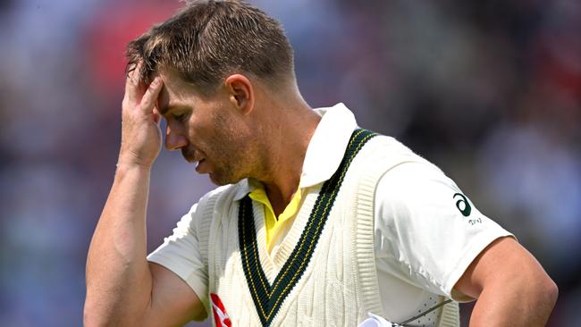 David Warner walks off after being dismissed by Chris Woakes during day one of the Fourth Ashes Test at Old Trafford. Picture: Getty Images