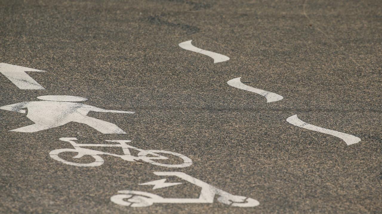 Signs on the path along Marine Parade in Miami. Picture: Glenn Campbell