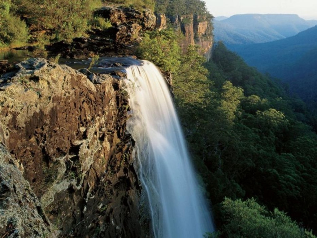 <span>8/21</span><h2>Fitzroy Falls</h2><p>Just under two hours from Sydney, Fitzroy Falls, a national park near Berrima, has some of the most magnificent scenery in the state. The waterfalls are only the tip of the iceberg, with lyrebird singing along some of the walking tracks, lookouts that oversee the lush gullies of <a href="https://www.nationalparks.nsw.gov.au/visit-a-park/parks/morton-national-park" target="_blank">Morton National Park</a>, and bush picnics by the river also on offer. Stay in nearby Berrima or Bowral to enjoy famous Southern Highlands style. Picture: Fitzroy Falls</p>