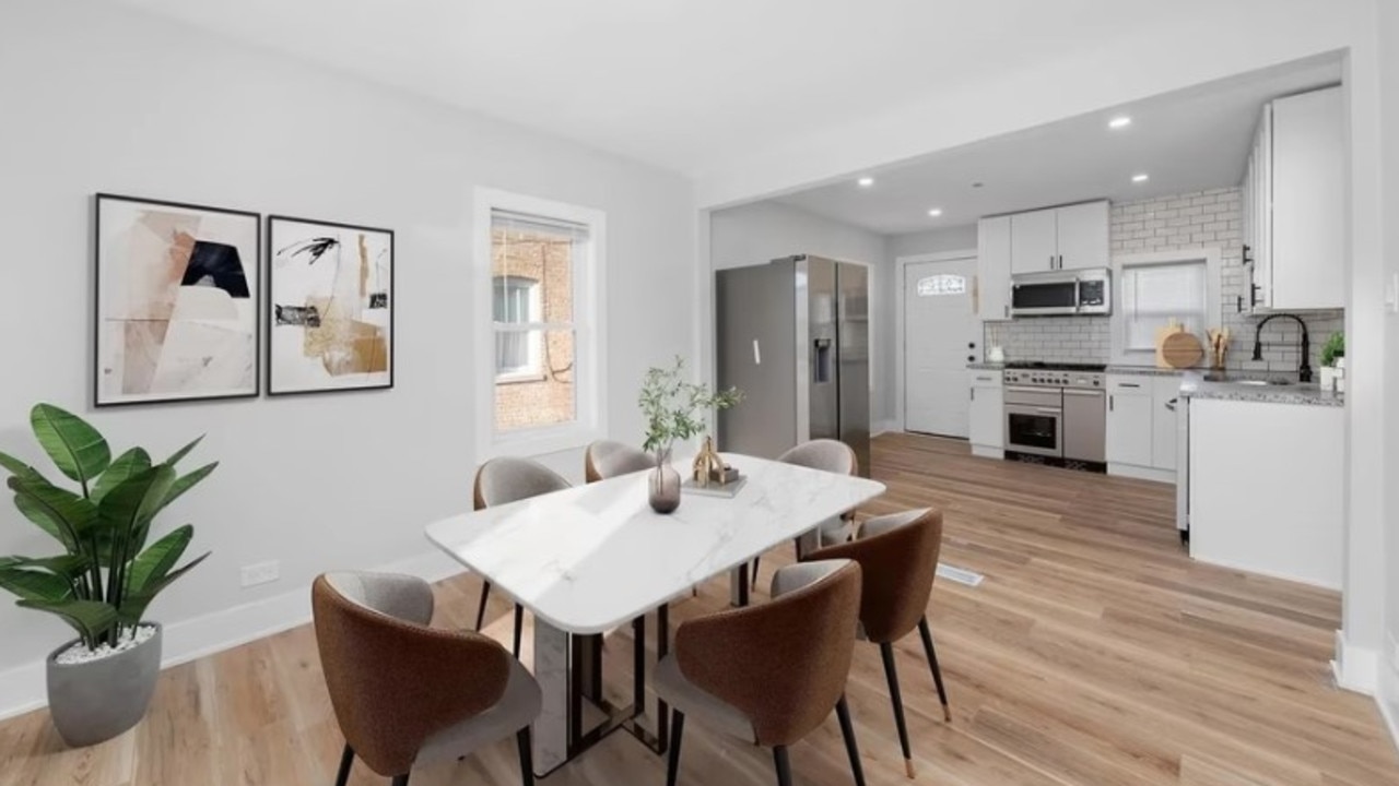The average-sized kitchen has a marble countertop and ample cabinet space. Picture: Realtor.com
