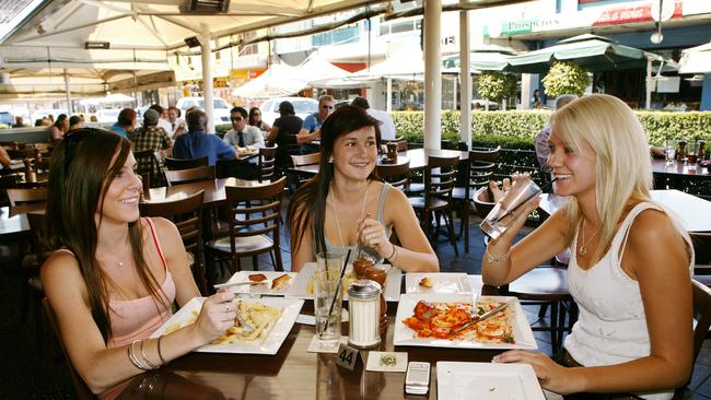 Friends Kat Richards, Alexandra Rose and Elise Dean eating out alfresco at a restaurant in Church St, Parramatta, in 2008, long before Church St’s problems. Picture: John Fotiadis