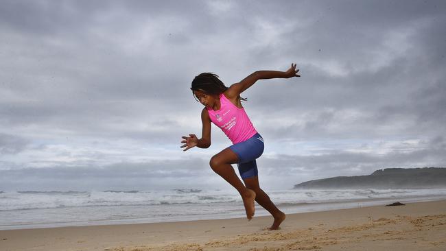 South Maroubra Nippers and Randwick Botany Little Athletics Centre gold medallist Malikye Kessie in full flight on Maroubra Beach. Picture: John Appleyard